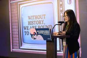 Author Janine Myung Ja speaking at the Overseas Korean Agency 2026 conference